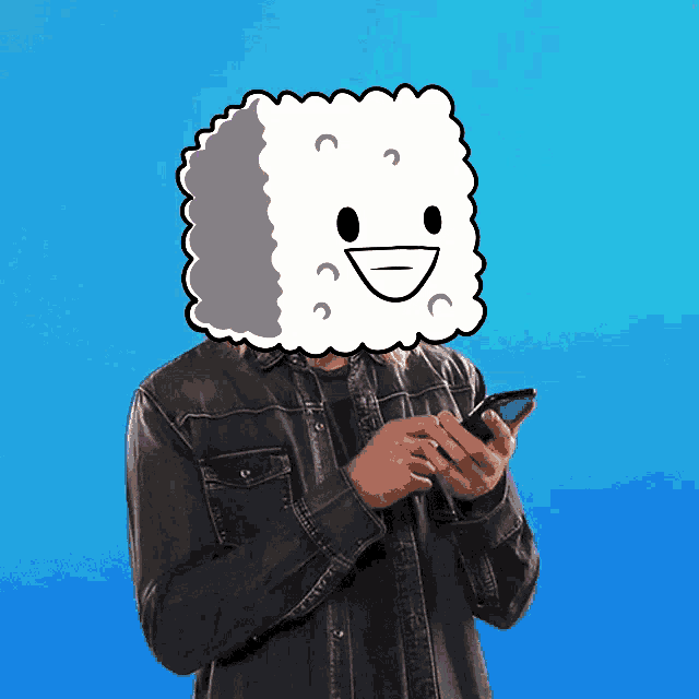 a man holding a cell phone with a cartoon character on his face