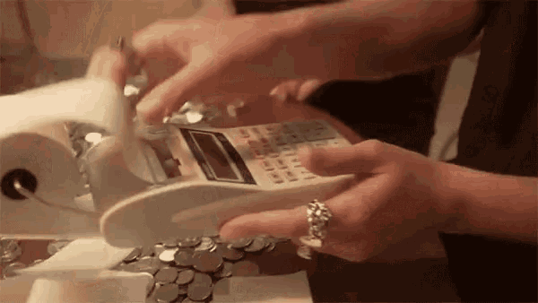 a person is using a calculator with the numbers 1 through 12 on the screen