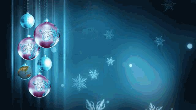 a blue background with christmas balls hanging from strings