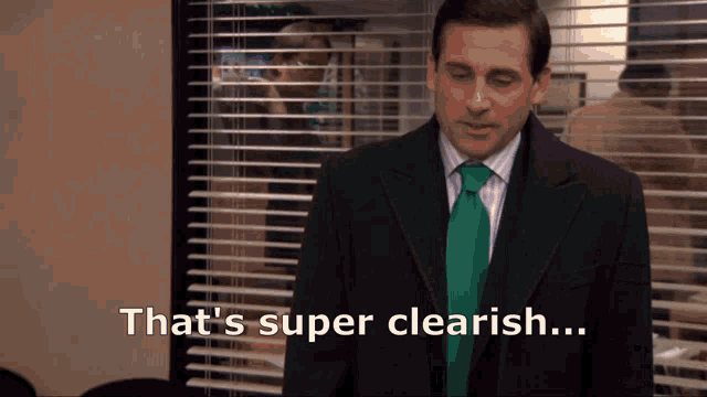 a man in a suit and green tie says that 's super clearish