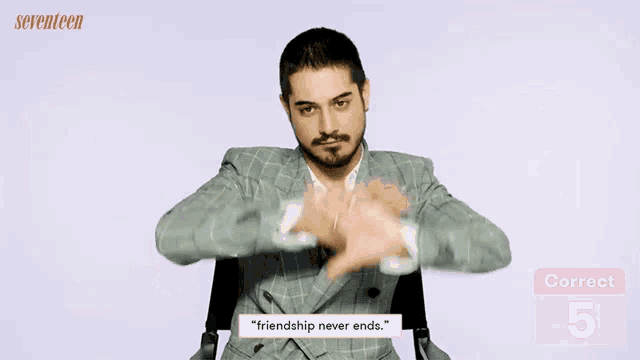 a man in a suit with the words " friendship never ends " on the bottom