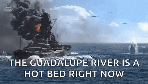 the guadalupe river is a hot bed right now with a battleship in the background