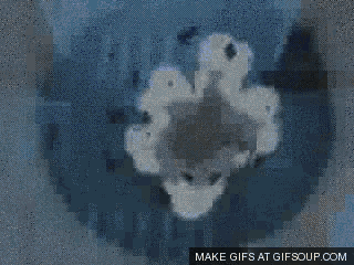 a gif of a man standing on top of a hill with the words make gifs at gifsoup.com below him