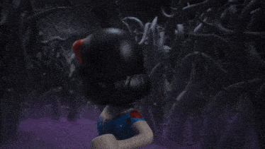 a cartoon character is holding a red hammer in a forest