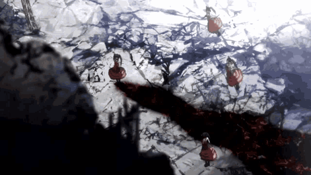 a group of people in red dresses are walking across a snowy field