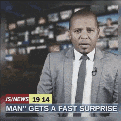 a man in a suit and tie stands in front of a js / news 19 14 man gets a fast surprise headline