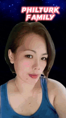 a woman in a blue tank top with the name philturk family written above her