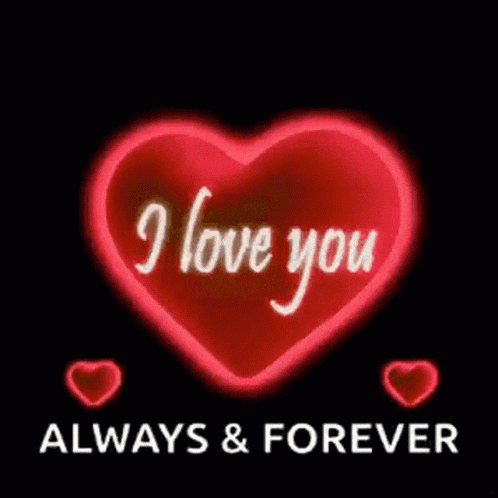 a red heart with the words `` i love you '' written on it .