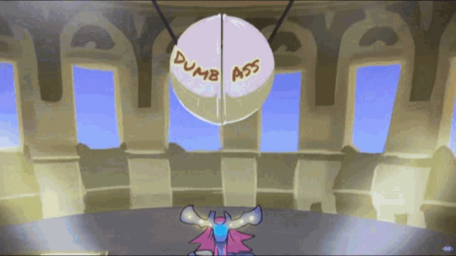 a dumb ass sign is hanging from a rope