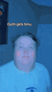 a man in a white shirt says goth girls hma