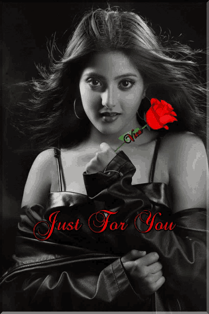 a black and white photo of a woman with a red rose and the words just for you below her