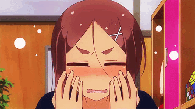 a girl with a x in her hair is making a face