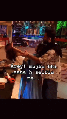 a man and a woman are hugging with the words arey mujhe bhi aana h selfie me