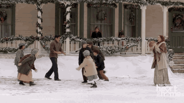 a group of people are playing in the snow with the words heart & frame on the bottom right
