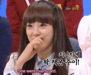 a girl is covering her mouth with her hand and the words she went overboard are above her