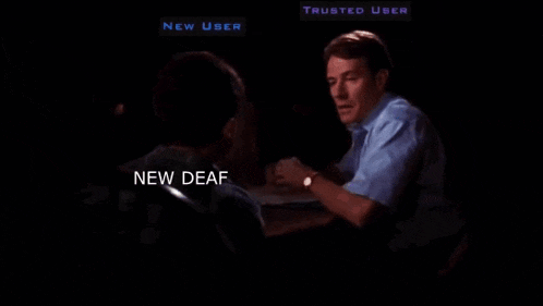 a man talking to another man with the words new deaf on the screen
