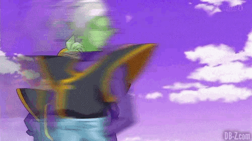 a blurry image of a person with a purple sky in the background