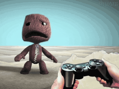 a video game controller is being held in front of a cartoon character with a zipper on his chest