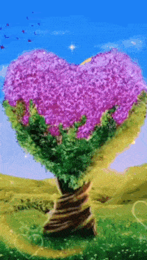 a heart shaped tree with purple flowers growing out of it .