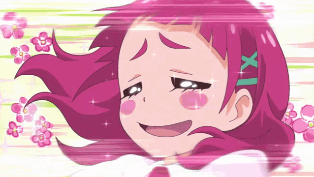 a girl with pink hair and a green x on her head