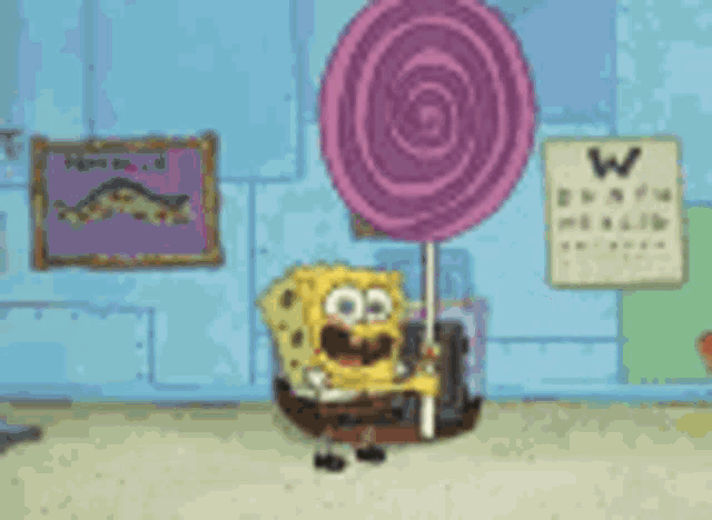 spongebob squarepants is holding a purple lollipop and a hand is reaching out to touch it .