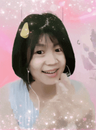 a girl wearing headphones and a yellow sticker on her head