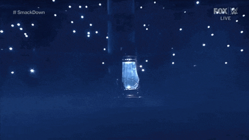 a fox live broadcast of smackdown with a blue lantern in the foreground