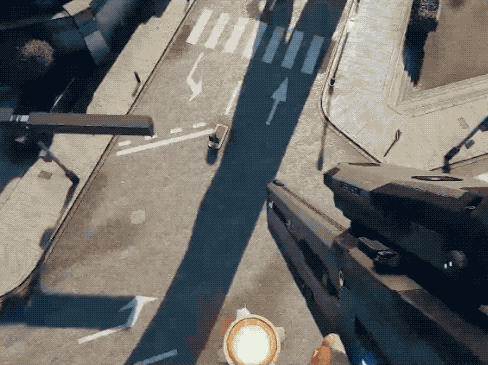 an aerial view of a city street with an arrow pointing right