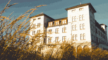 a large white building with the letters ff on the top