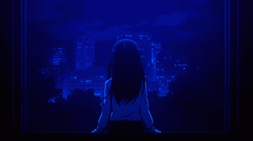 a girl is looking out a window at the full moon