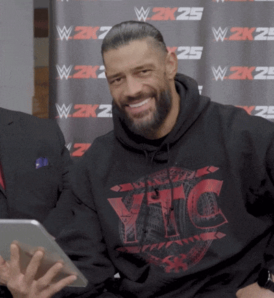 a man wearing a black hoodie that says vic on it