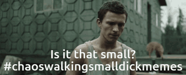 a man is standing in front of a building and the caption says is it that small