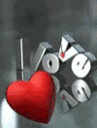a red heart is sitting next to the word love on a metal surface .