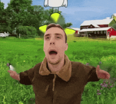 a man in a brown jacket stands in a field with his arms outstretched in front of a cartoon chicken