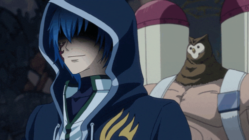 a man in a hooded sweatshirt with a flame on the front