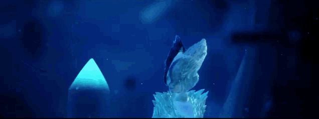a statue of a wolf is surrounded by ice