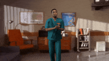 a man in a scrub has a badge on his chest that says ' nurse ' on it