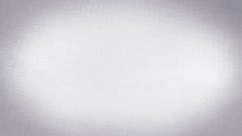 two pieces of wood with a circle in the middle on a white surface