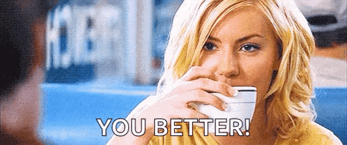 a woman is drinking a cup of coffee and the words you better are on the screen .