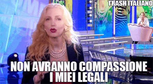 a woman with blonde hair and a pearl necklace says trash italiano