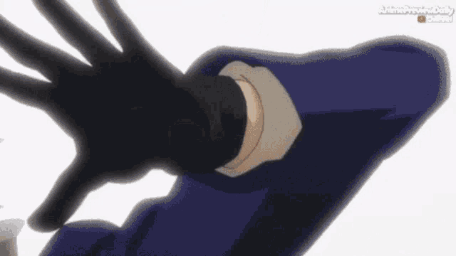 a person 's hand is reaching out towards another person 's arm with blood coming out of it .