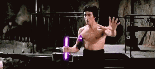 Bruce Lee Light Saber GIF - Bruce Lee Light Saber Fight GIFs
