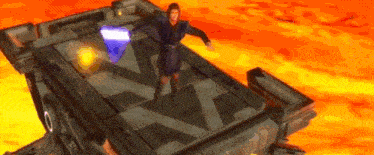 a woman is standing on top of a very large object holding a light saber .