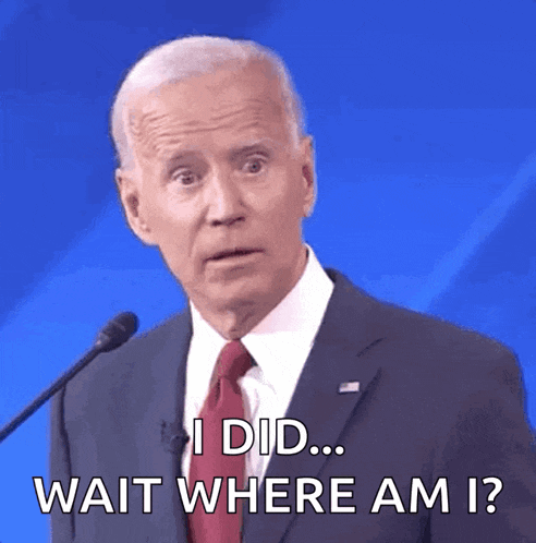 a man in a suit and tie is talking into a microphone and says " i did wait where am i "