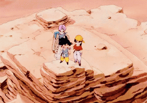 a group of cartoon characters are standing on a rocky cliff