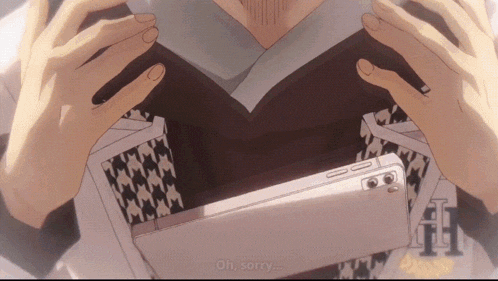 a person is holding a cell phone in their hands and the words oh sorry are visible