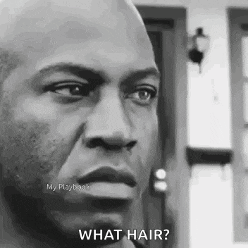 a man is standing in front of a house and asking what hair .
