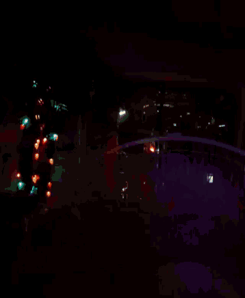 a dark room with a red light in the middle