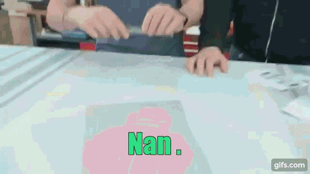 a person is holding a piece of paper with the word nan written on it