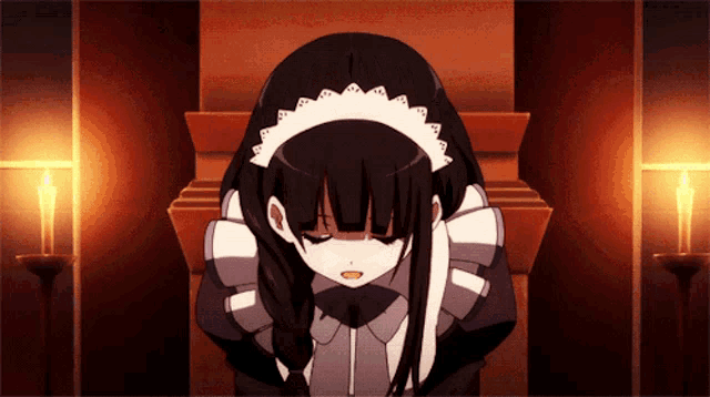 a girl in a maid outfit is kneeling down with her head down